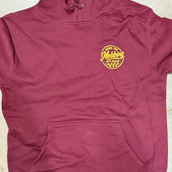 Maroon Heritage Hoodie worn by model, left chest clay screenprinted circle checkered logo 'Down For Dust -Off-Road-', premium heavyweight maroon pullover for off-road crew